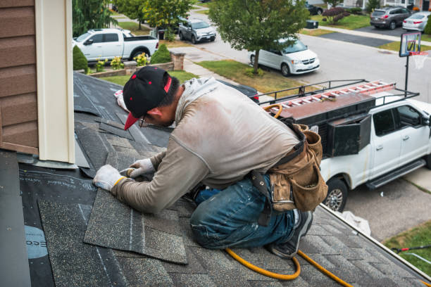 Professional Emergency Roof Repair technician working in Ruffs Dale, PA